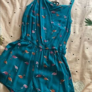 Shorts romper with flamingo print